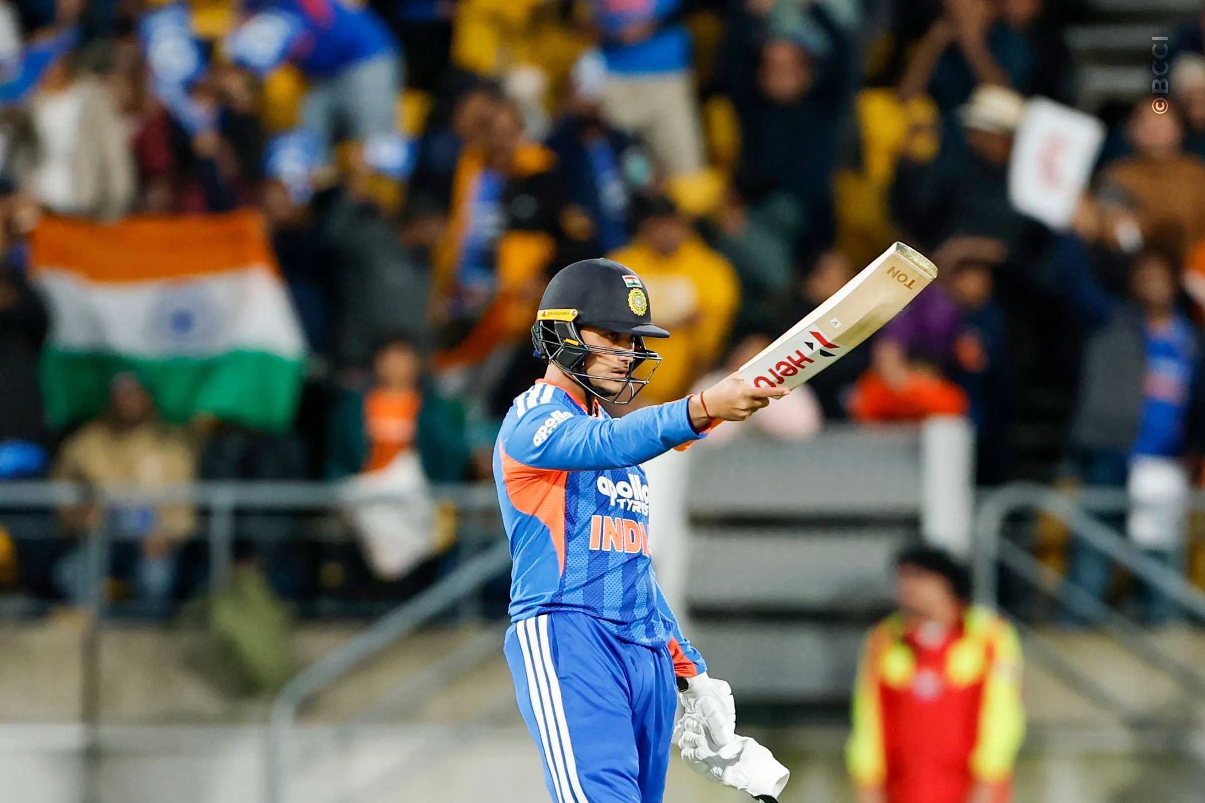 Abhishek Sharma of India raises his bat after scoring a fifty during the 3rd T20I match between New Zealand and India at the Hnry Stadium, Wellington, New Zealand on October 27, 2026.Photo: Surjeet Yadav / CREIMAS for BCCI