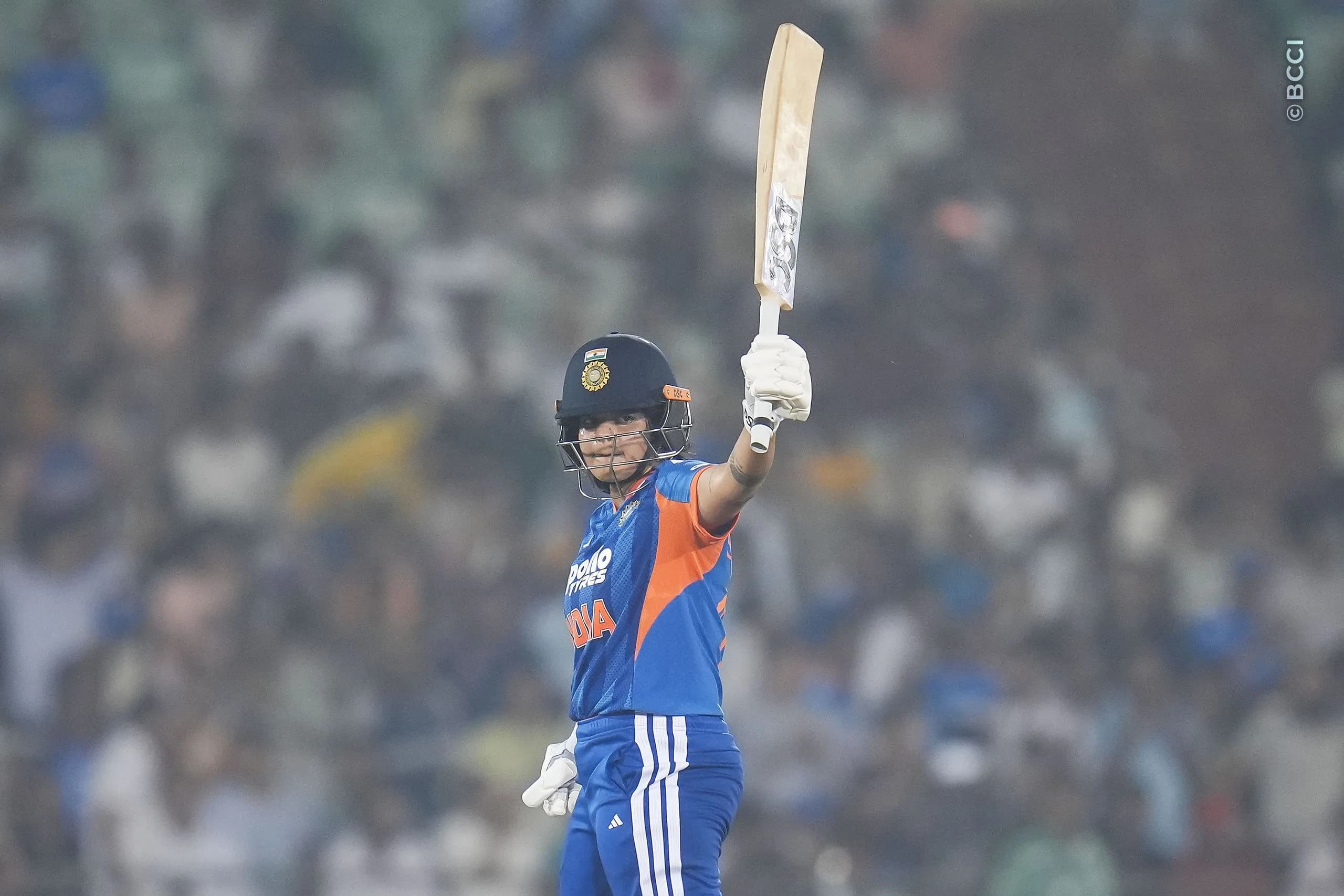 Shafali Verma (VC) of India raises her bat after scoring fifty runs during the 2nd T20I match between India Women and Zimbabwe Women at the Shaheed Veer Narayan Singh International Stadium, Raipur, India on October 18, 2026.Photo: Faheem Hussain / CREIMAS for BCCI