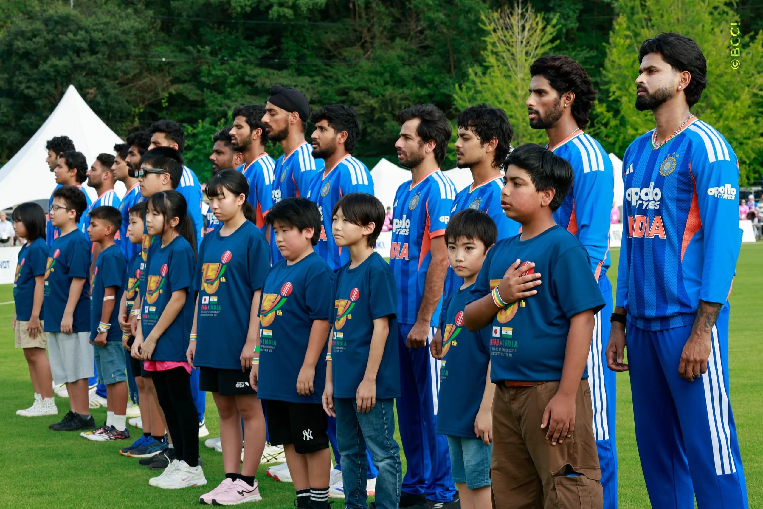 India players stand for national anthem during the Only T20I match between Japan and India at Sano Cricket Ground, Sano, Japan, on September 22, 2026.

Photo:  Deepak Malik / CREIMAS for BCCI