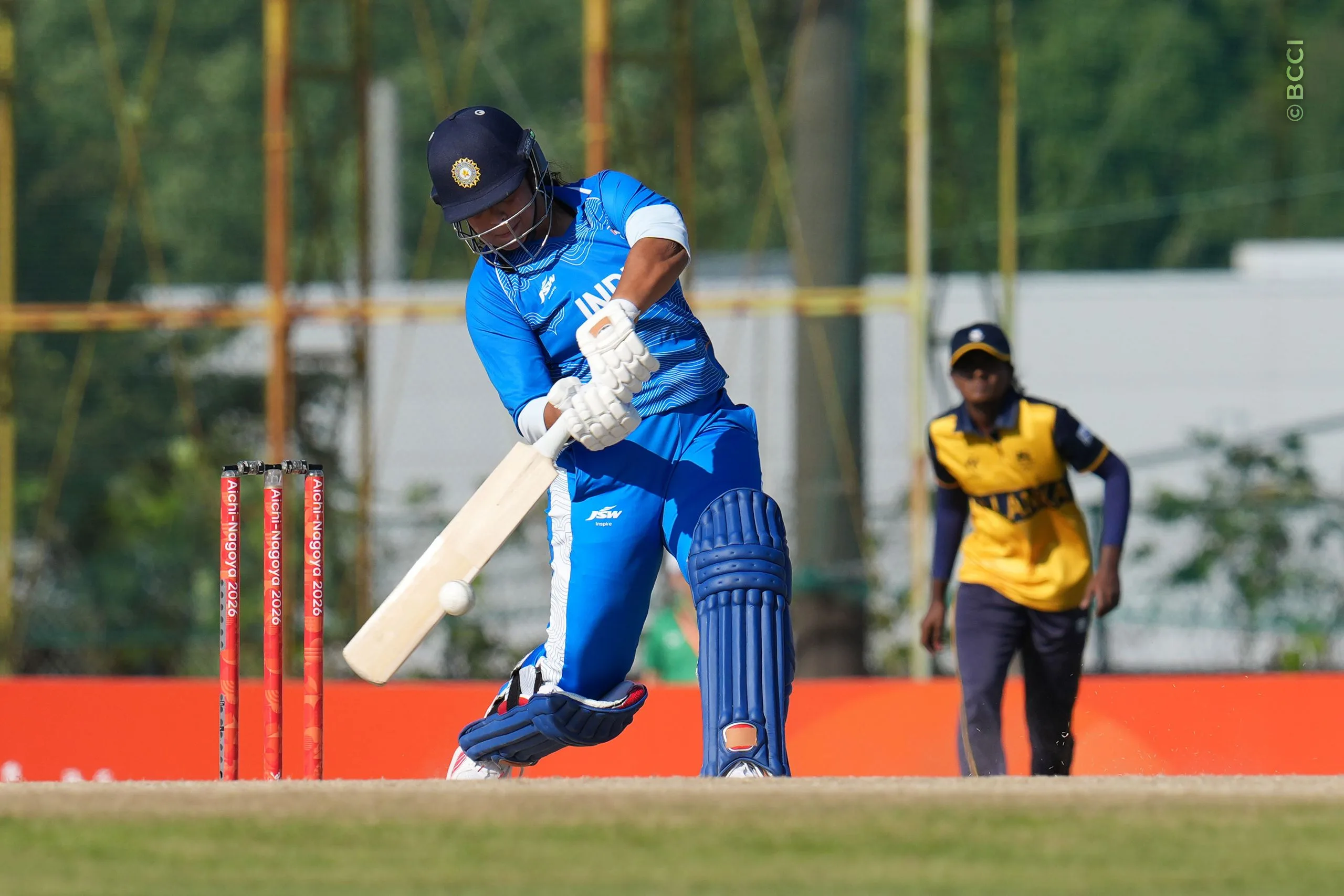Richa Ghosh of India plays a shot during the The Final match between Sri Lanka Women and India Women at Korogi Sports Park, Nisshin, Japan, on September 22, 2026.

Photo: CREIMAS for BCCI