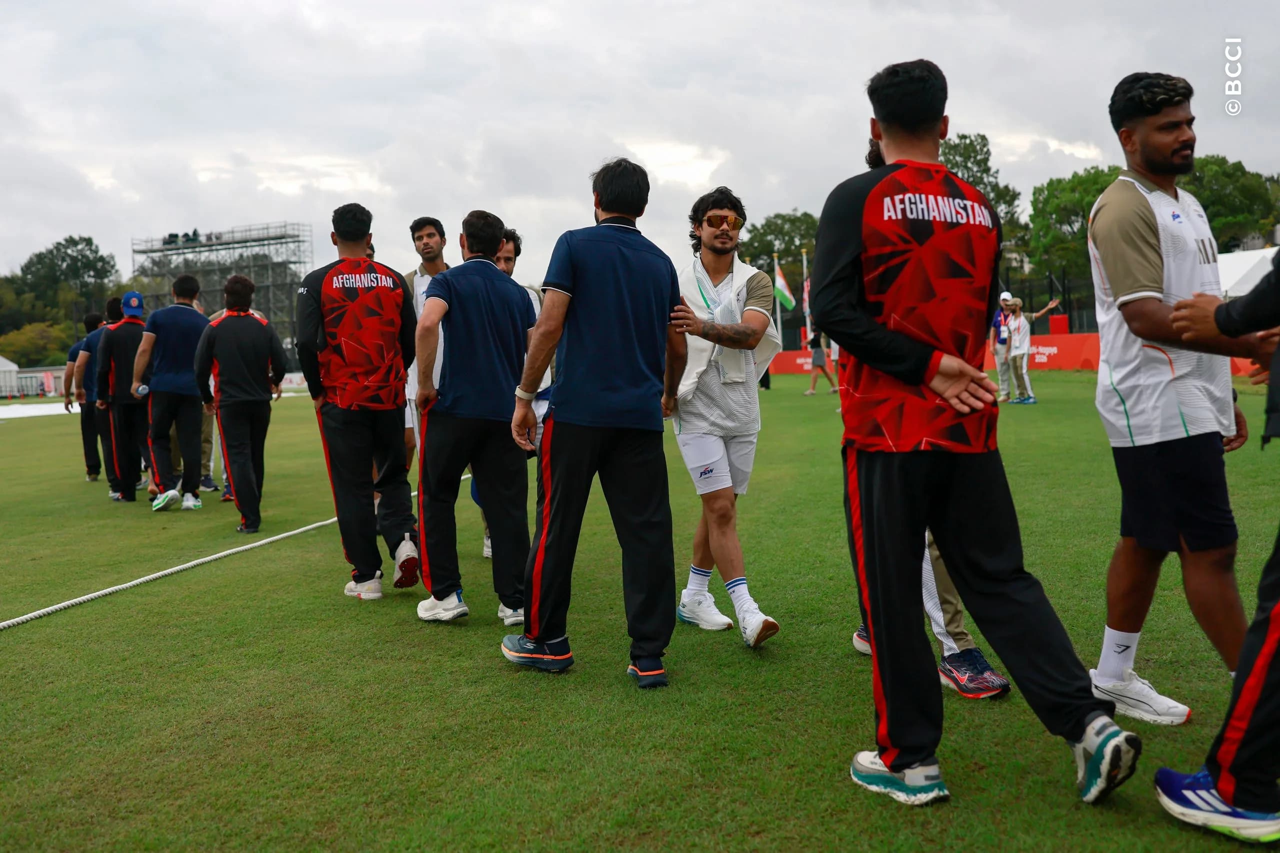 India and Afghanistan players after match called off during the Quarter-Final match between the India and the Afghanistan at Korogi Sports Park, Nisshin, Japan, on September 28, 2026.

Photo:  Deepak Malik / CREIMAS for BCCI