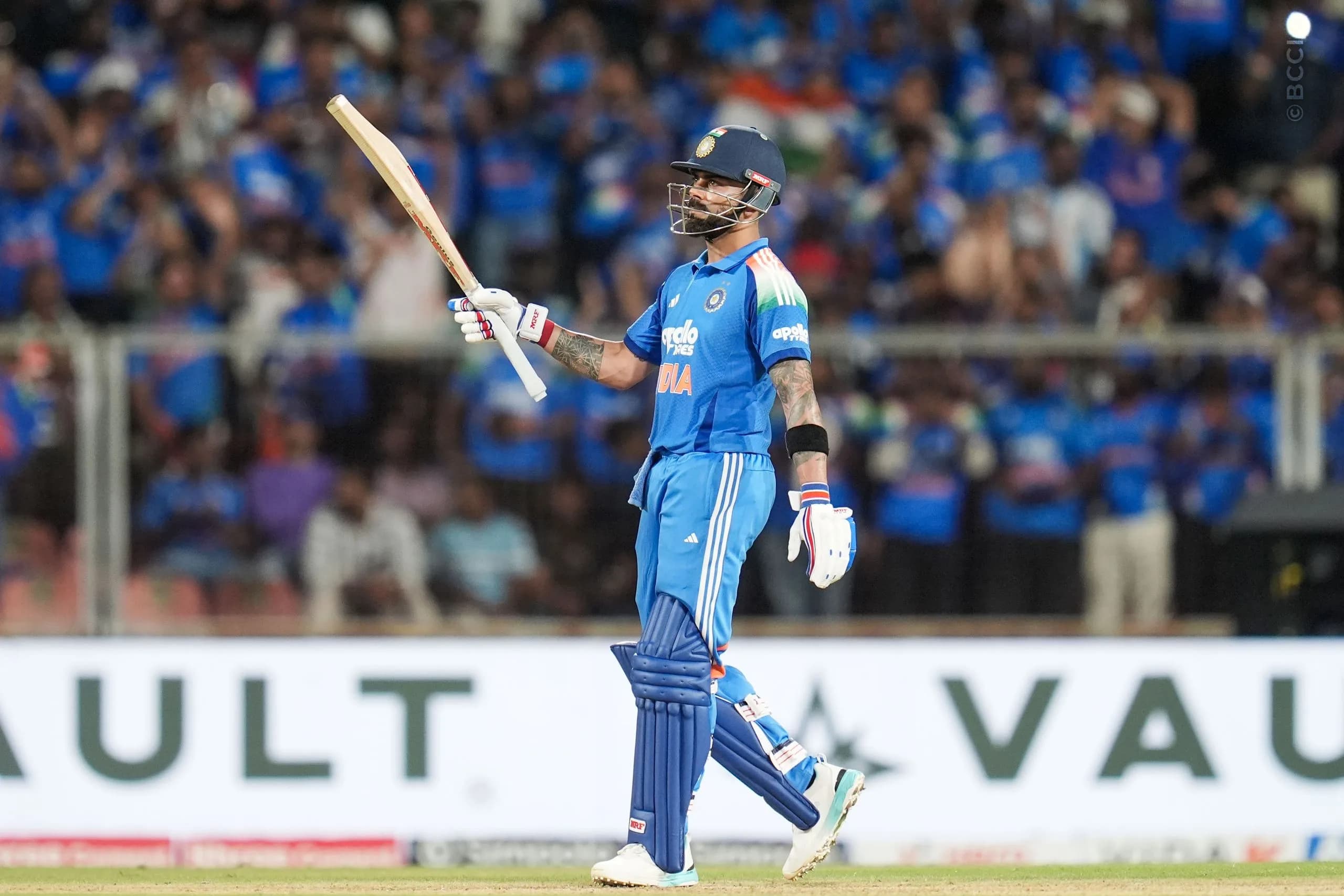 Virat Kohli of India raises his bat after scoring a fifty runs during the 1st ODI match between India and West Indies at the Sports Hub International Cricket Stadium, Thiruvananthapuram India on September 27, 2026.

Photo: Faheem Hussain / CREIMAS for BCCI