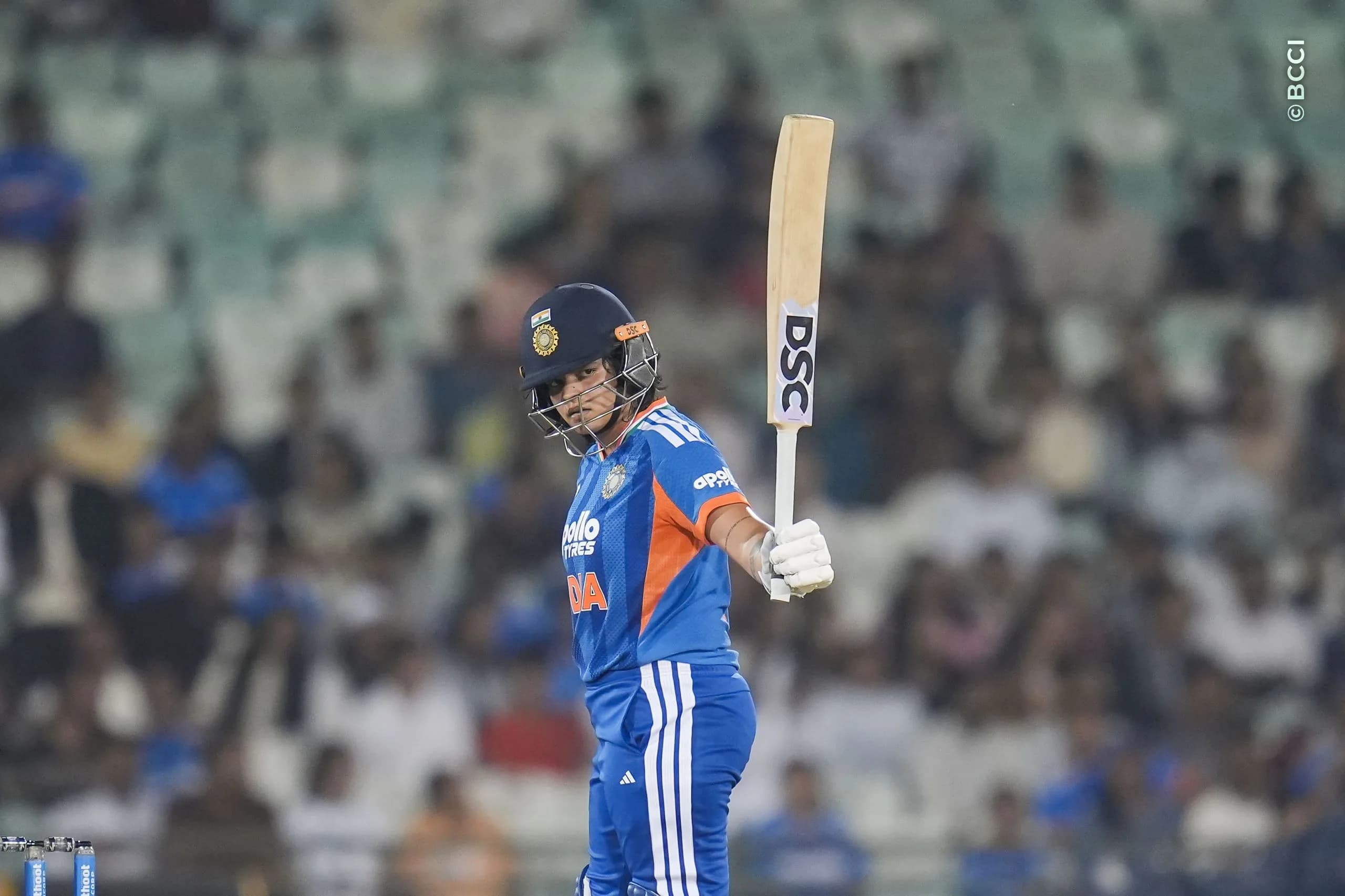Shafali Verma (VC) of India raises her bat after reaching fifty runs during the 3rd T20I match between India Women and Zimbabwe Women at the Shaheed Veer Narayan Singh International Stadium, Raipur, India on October 20, 2026.Photo: Faheem Hussain / CREIMAS for BCCI
