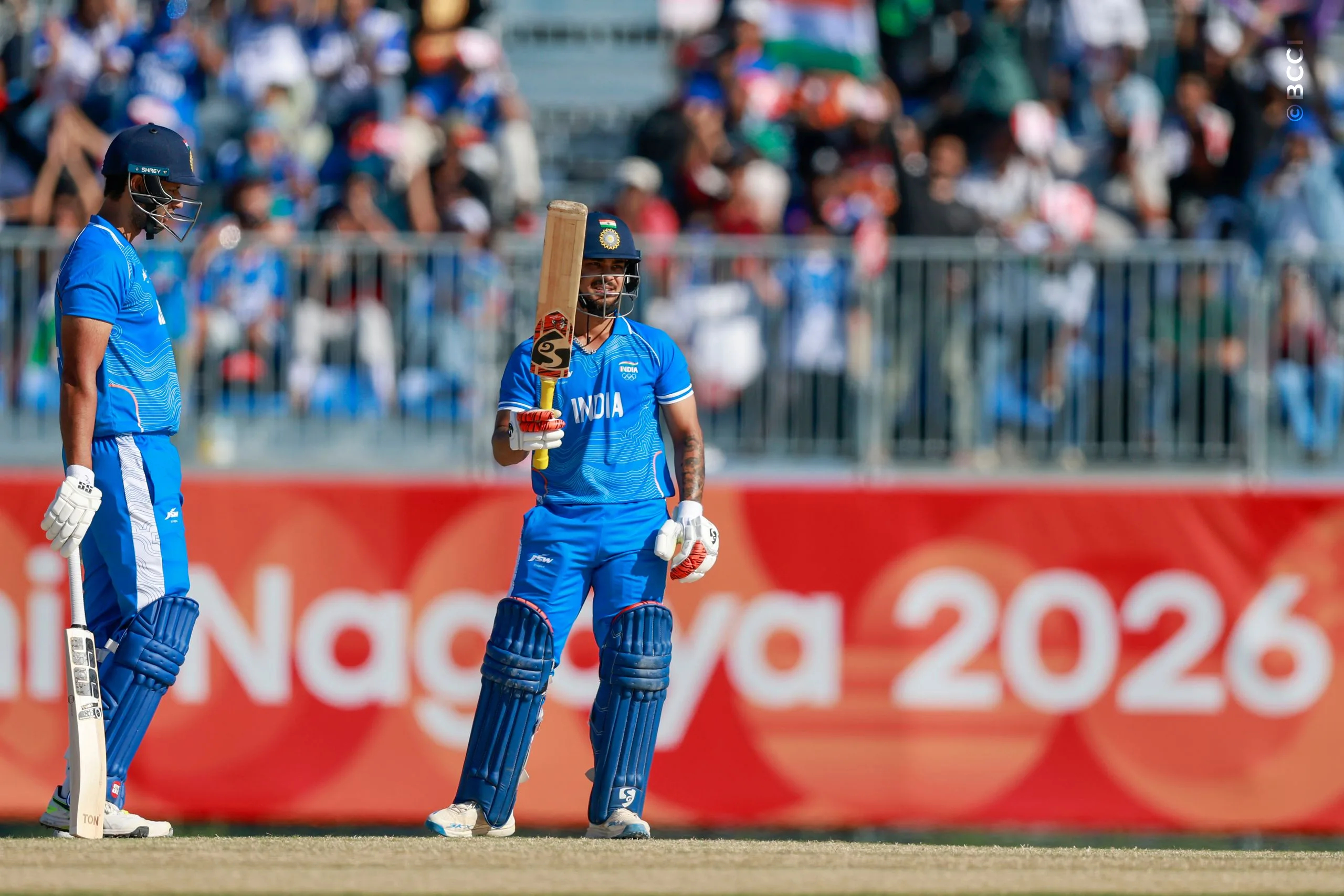 Ishan Kishan of India raises his bat after scoring a fifty during the Semi-Final match between the India and the Sri Lanka at Korogi Sports Park, Nisshin, Japan, on October 1, 2026.

Photo:  Deepak Malik / CREIMAS for BCCI
