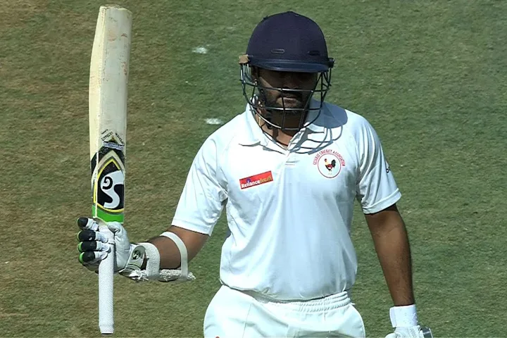 Parthiv, Juneja help Gujarat take lead